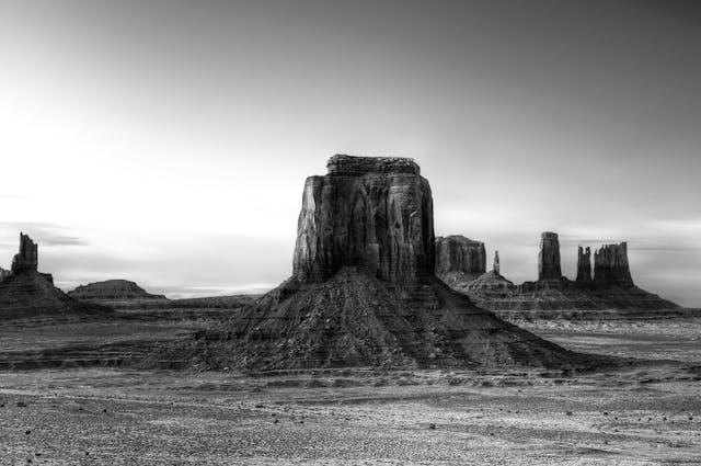 Ethereal clouds over red rock butte at dusk in Monument Valley, Arizona