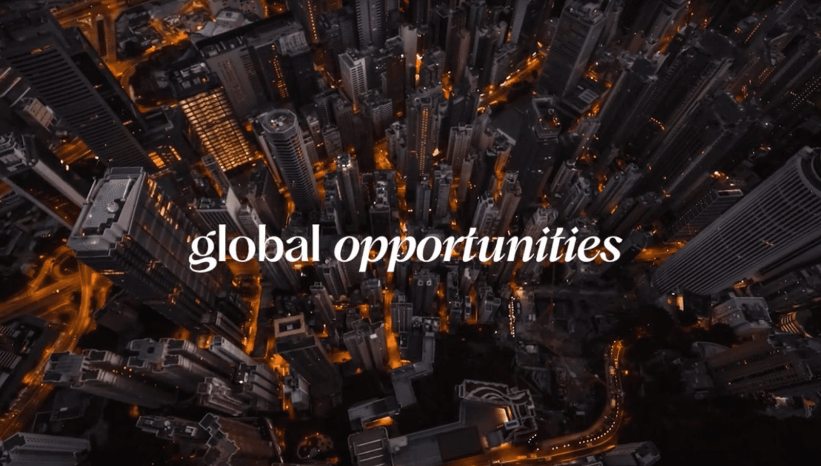 Aerial view of city with "global opportunities" text overlay