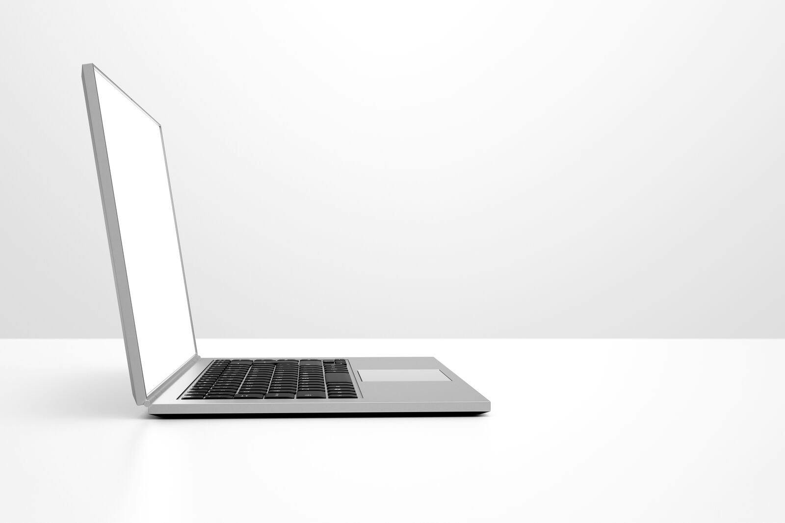 Open laptop computer with bright screen, on white background, cut out